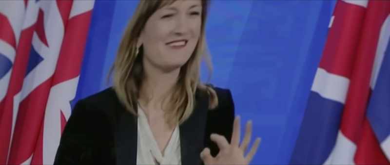 SHE CHUCKLES