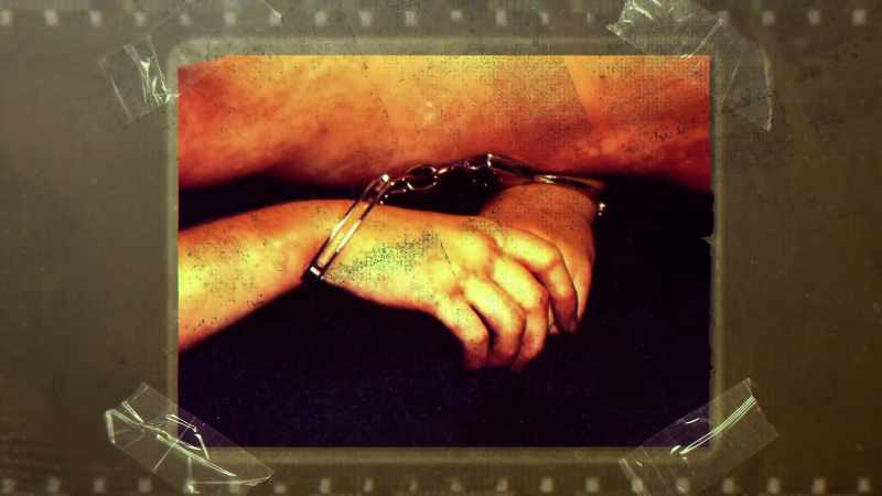 She had handcuffs on her wrists