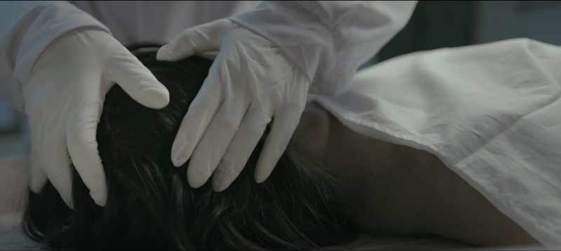 She was hit on the head with a blunt object