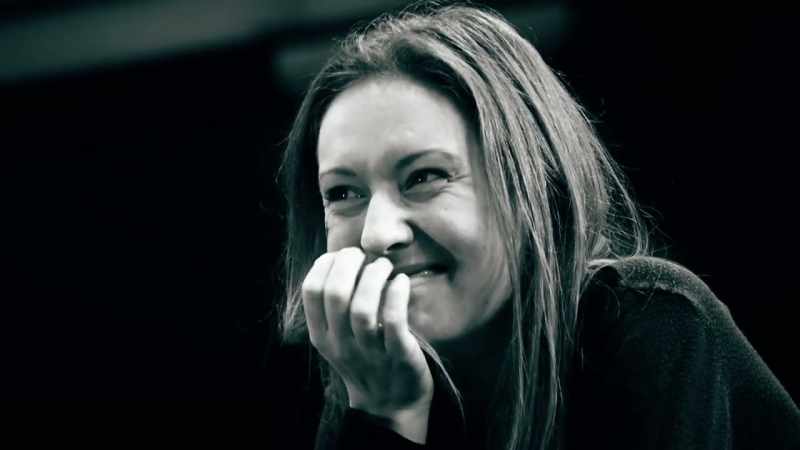 She laughed as proceedings took place