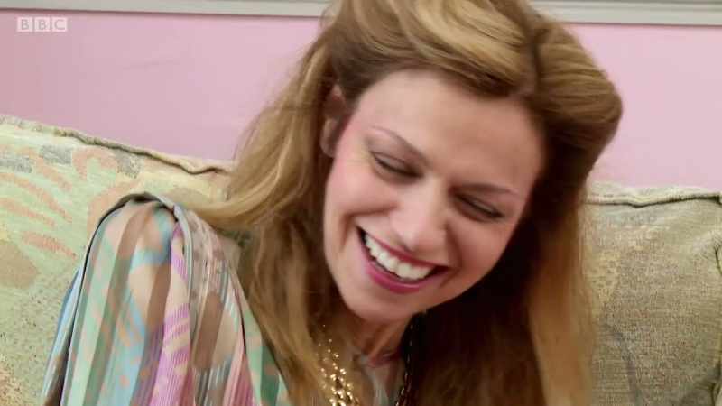 SHE LAUGHS