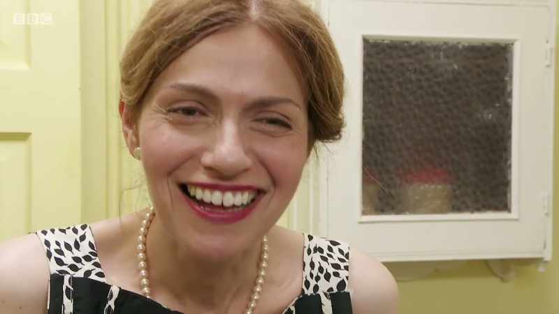SHE LAUGHS