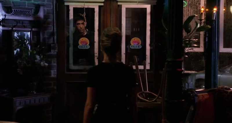 She steps slowly towards the door, then more quickly