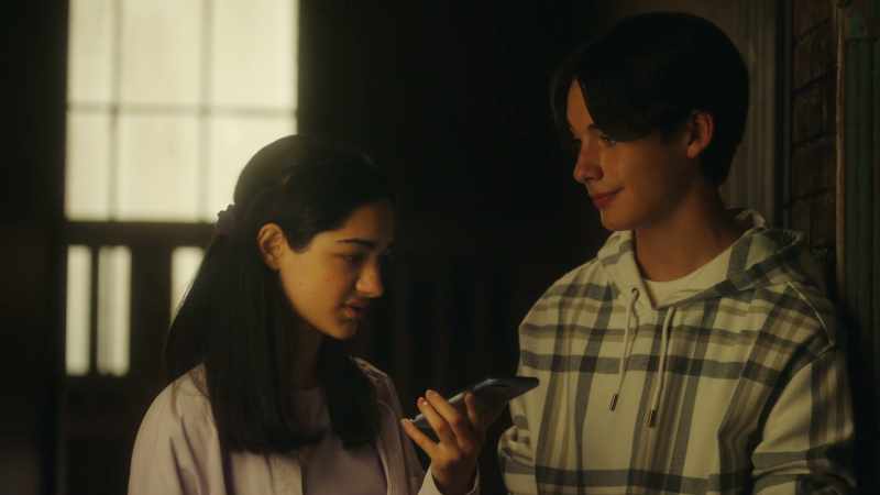She takes it and she puts it in her bag. But