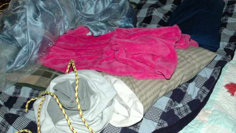 She was tied with bungee cords
