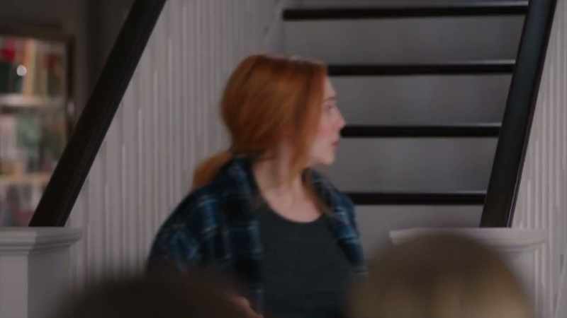 She's in her pajamas, and her hair's messy