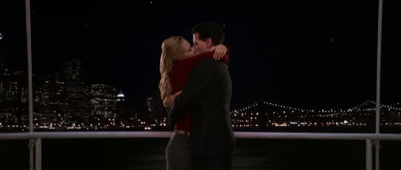 She's kissing him