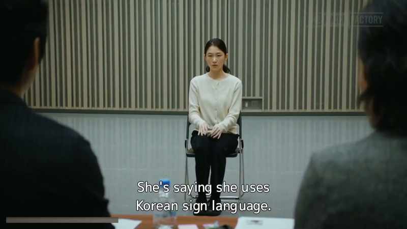 She's saying she uses Korean sign language