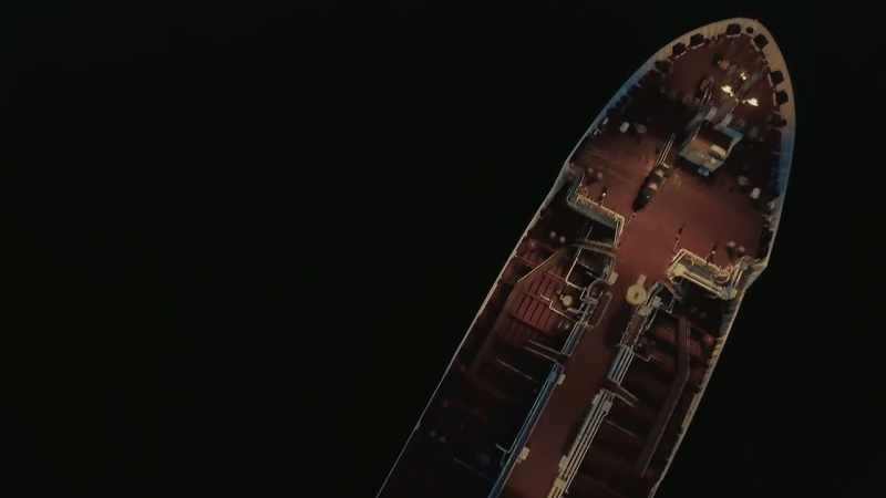 (ship horn blares)