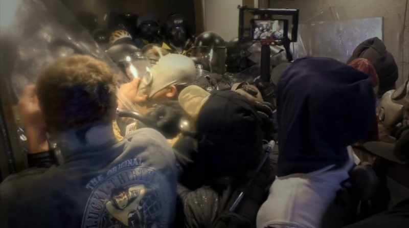 (shouts): Come on, MPD! Dig in! Push 'em back!