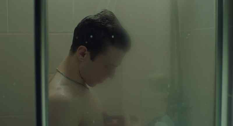 [shower running] [tense music builds]