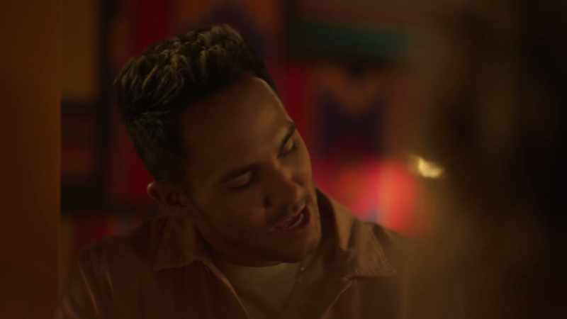 [singing in Spanish]