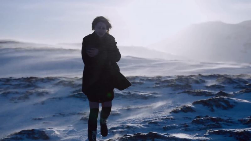 [sings in Icelandic, voice quavering]