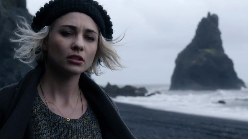 [sings softly in Icelandic, voice echoing]
