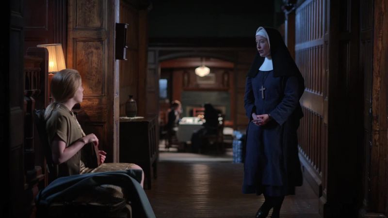 Sister Julienne is telephoning the Women's Hostel