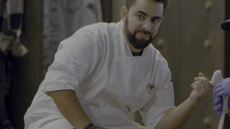 Slicing through the chocolate, and it sliced pretty fast, so