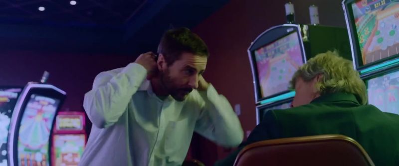 [slot machines chiming]