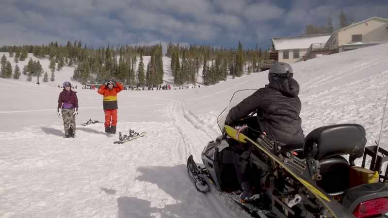[snowmobile starts]