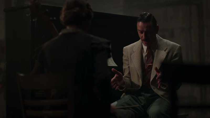 So we go in, we sit down, and I'm on his lap