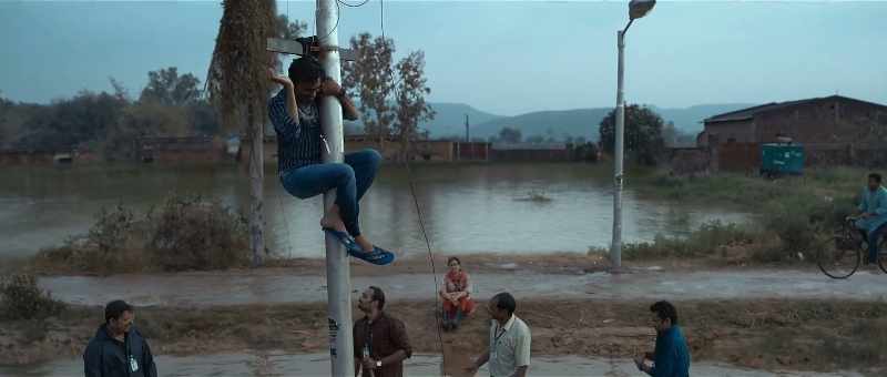 So scared of his girlfriend that he climbed up a pole for her?