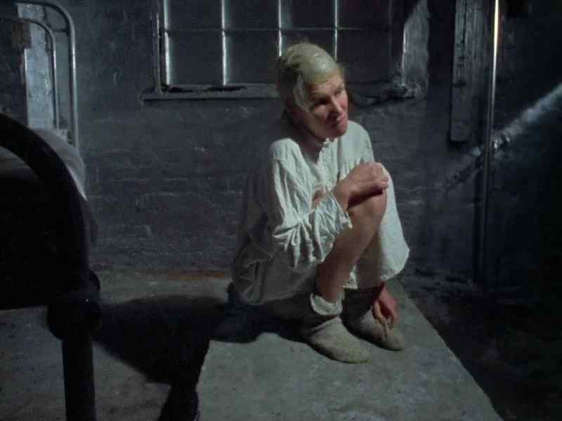 (Softly) Wicked old bitch