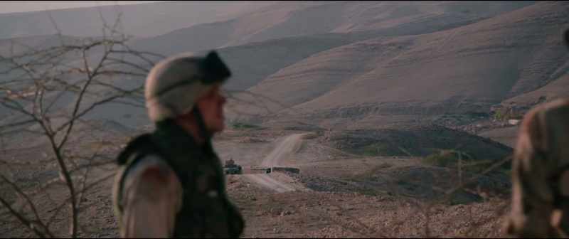 [Soldier on radio] Sergeant Harper, main gate