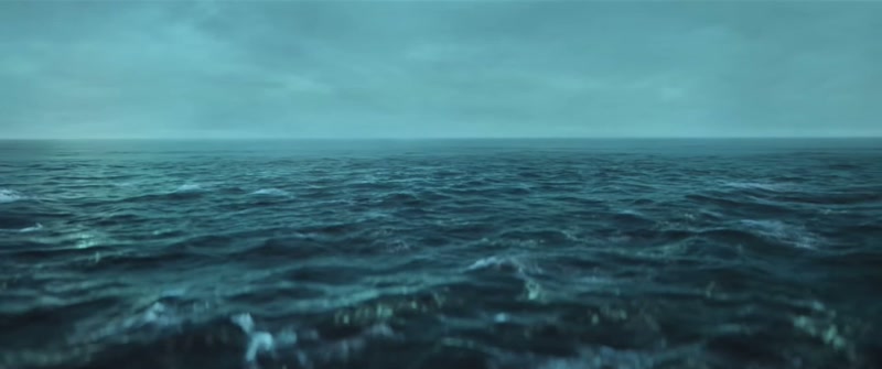 (solemn music) (waves sloshing)