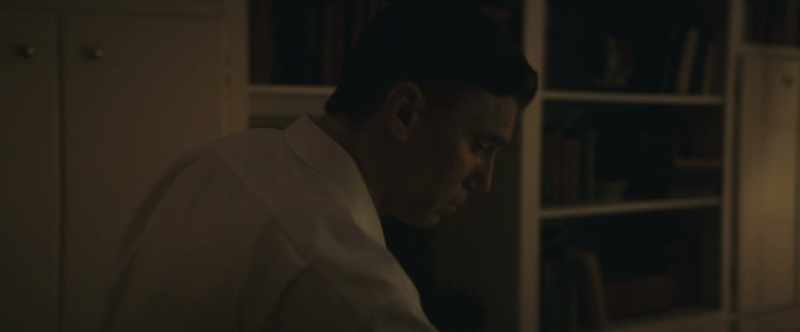 (somber music continues)