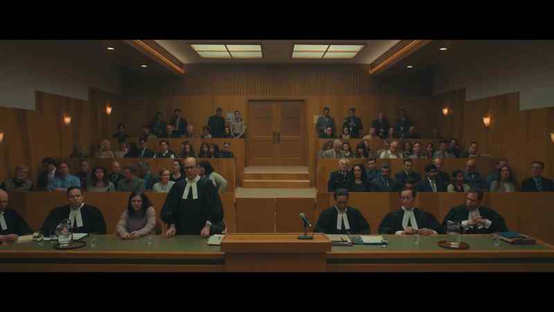 [♪ somber music playing] - [courtroom audience murmuring]