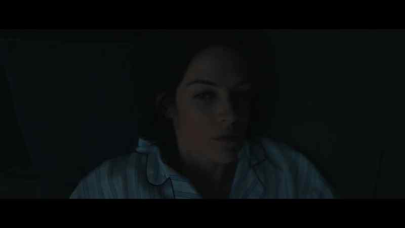 [♪ somber music playing] -[rain pattering]