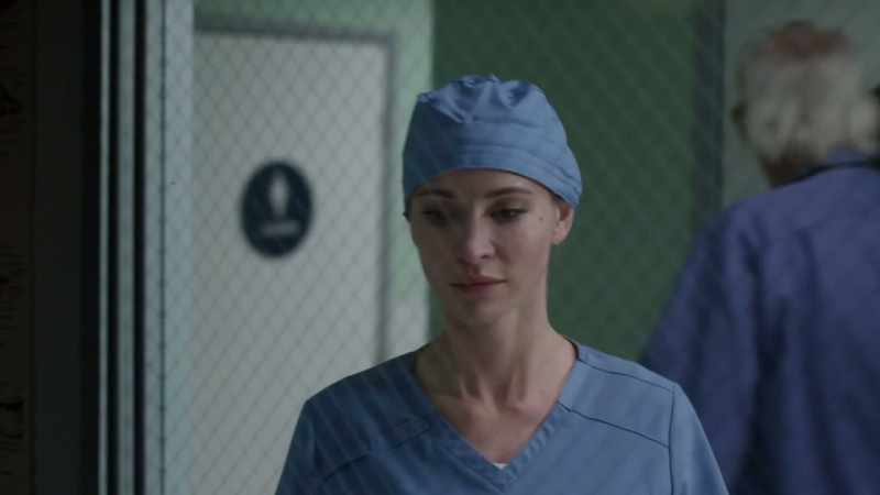 [somber music playing]