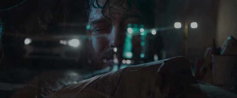 [somber music playing]
