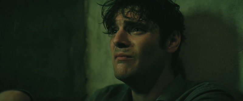 [somber music plays]