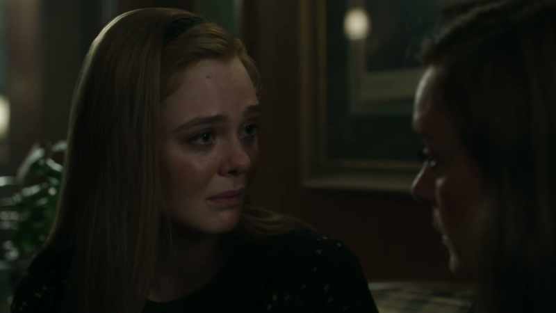 [somber music]