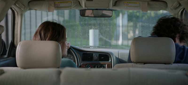 [somber music]
