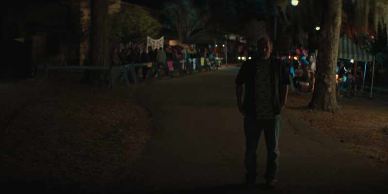 [somber music]