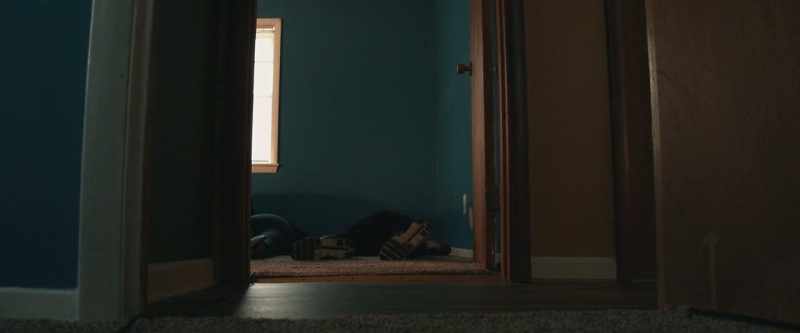 [somber music]