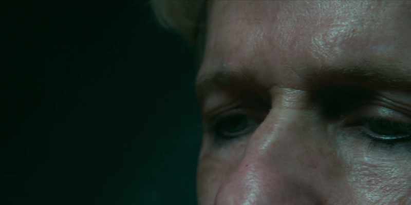 [somber music]