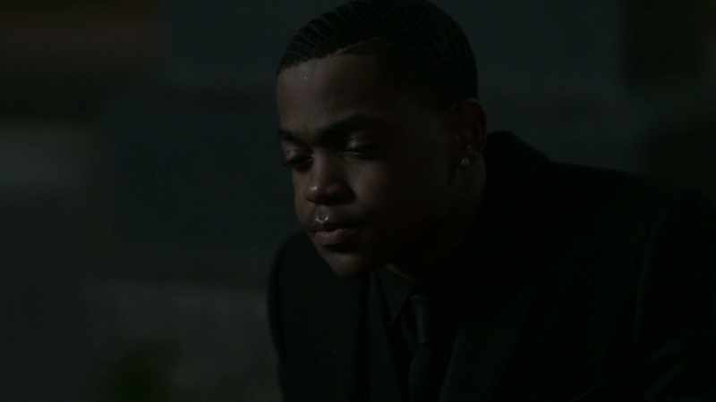 [somber music]