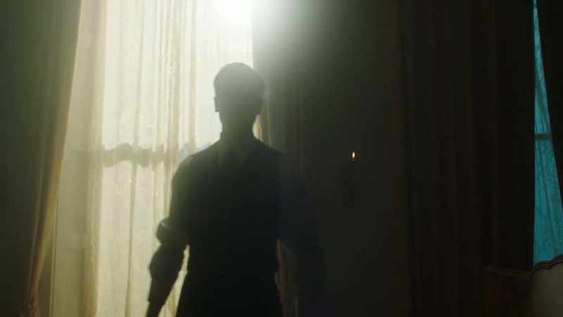 [somber music]