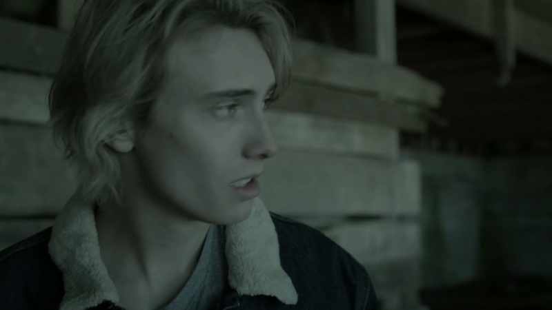 [somber music]