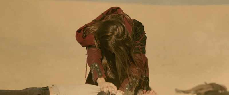 [somber orchestral music]