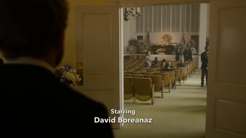 [somber piano music playing]