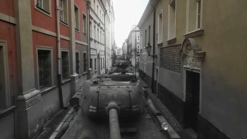 Soviet tanks storm down its narrow streets