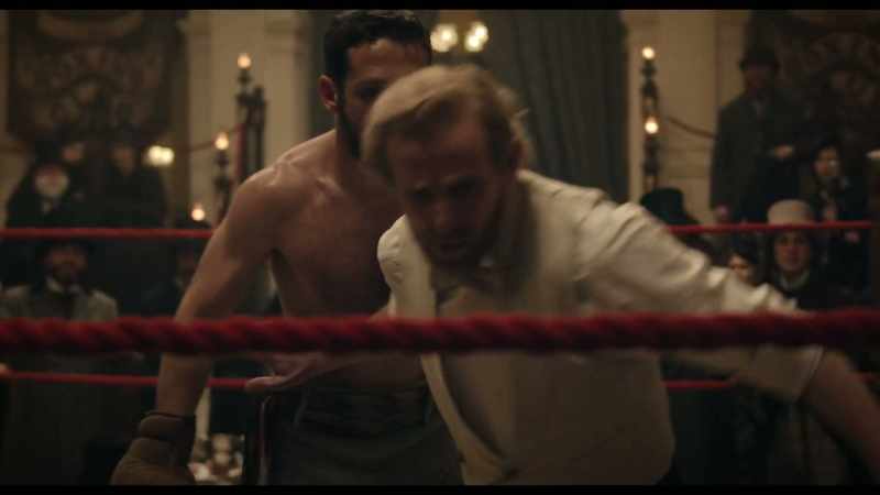 [spectators cheer]