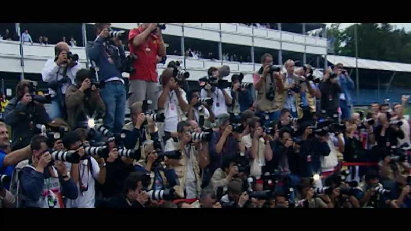 [spectators cheer]