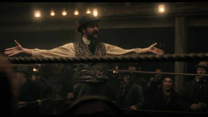 [spectators cheer]