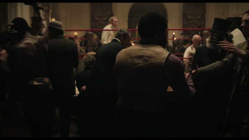 [spectators cheering]