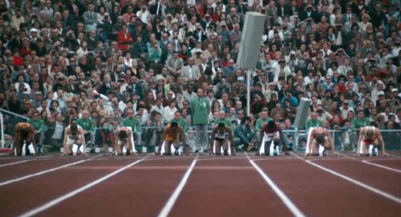 (spectators murmuring, chattering)