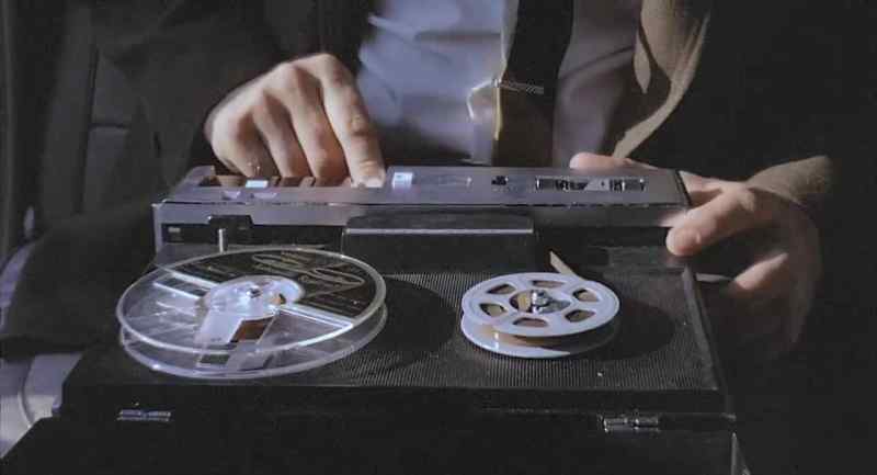 (squeaky rewinding tape)